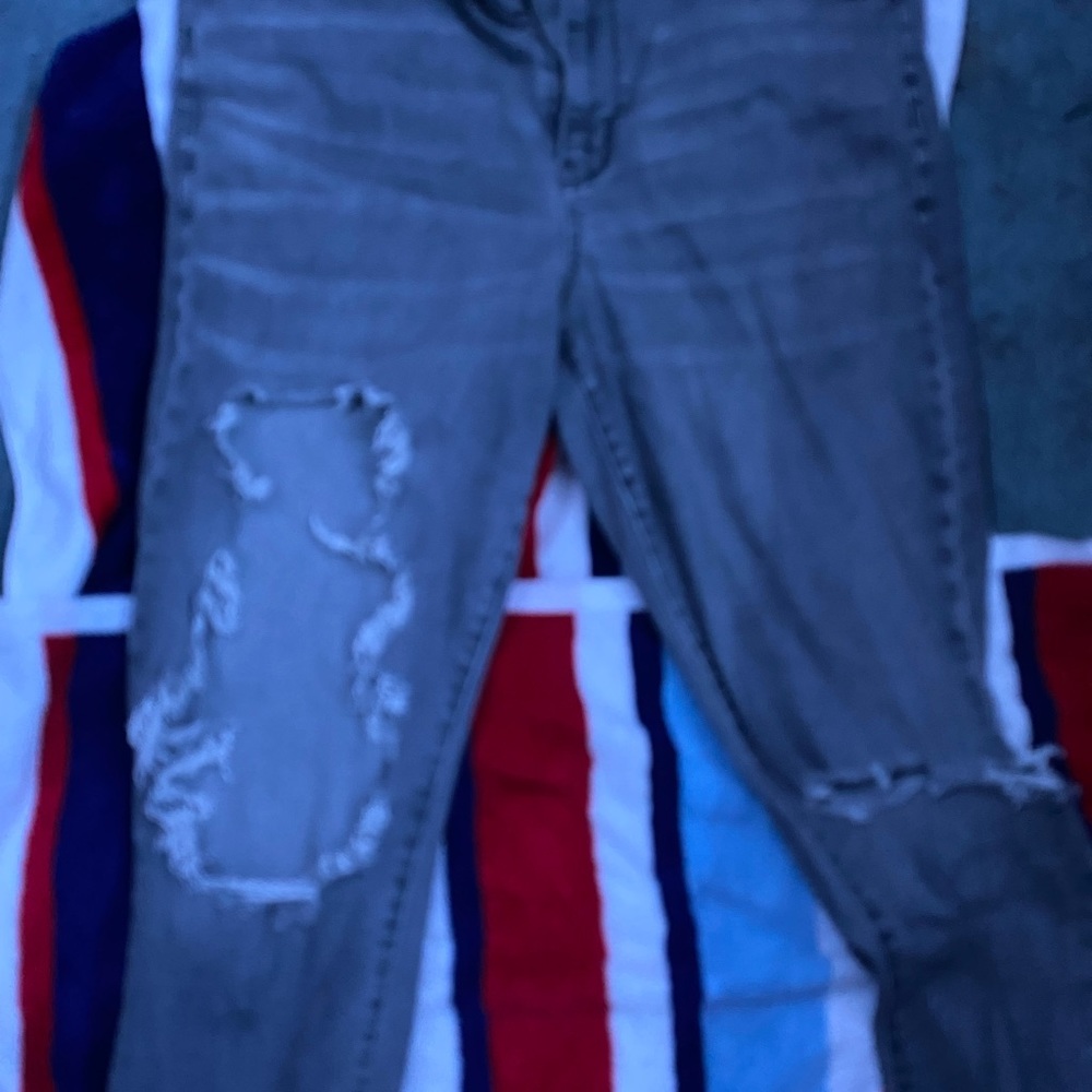 grey ripped jeans